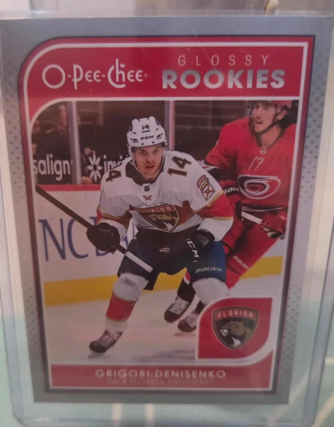 O-Pee-Chee Glossy Rookies Grigori Denisenko Hockey Card 2021-22