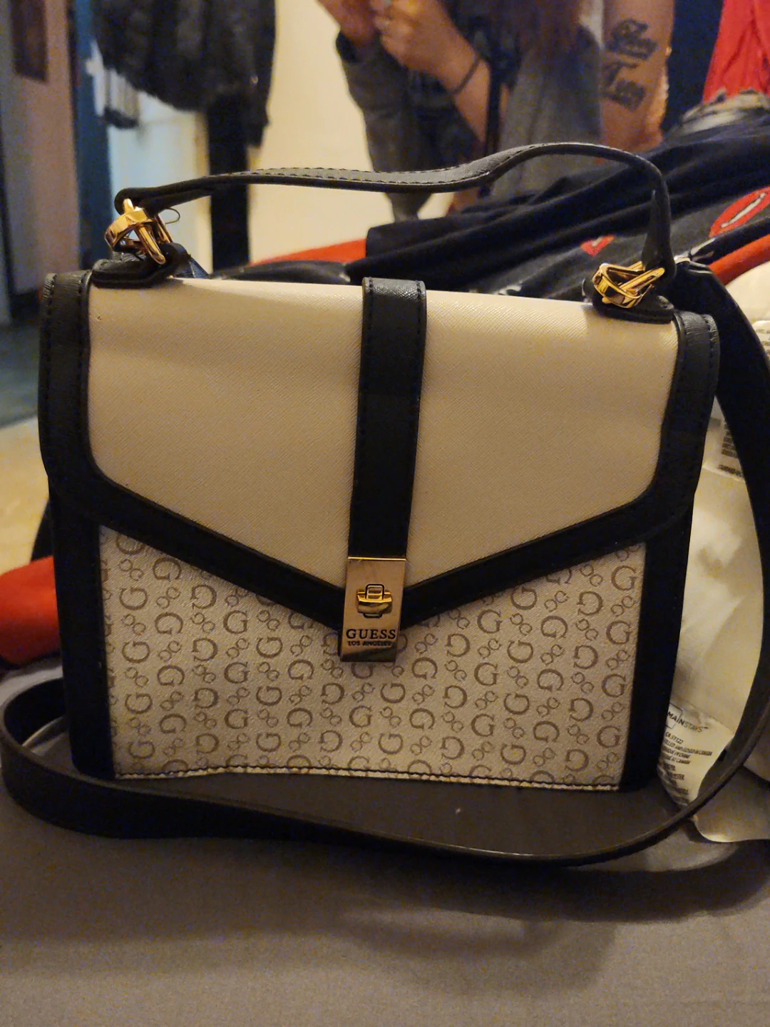 Guess handbag with G logo pattern$75 p.u.o