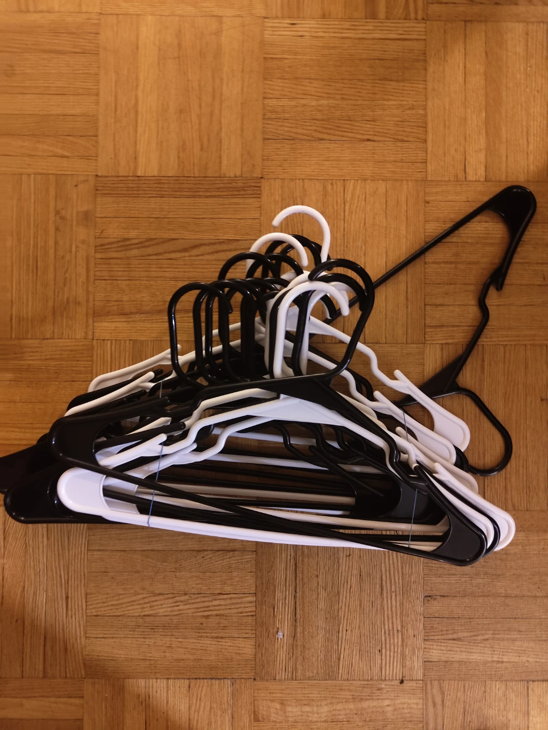 Set of Black and White Plastic Hangers