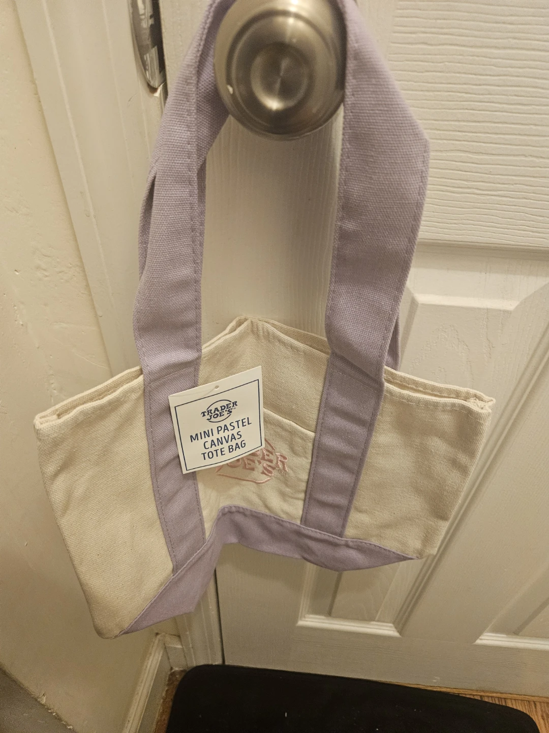 Trader Joe's Large canvas tote and three mini totes.