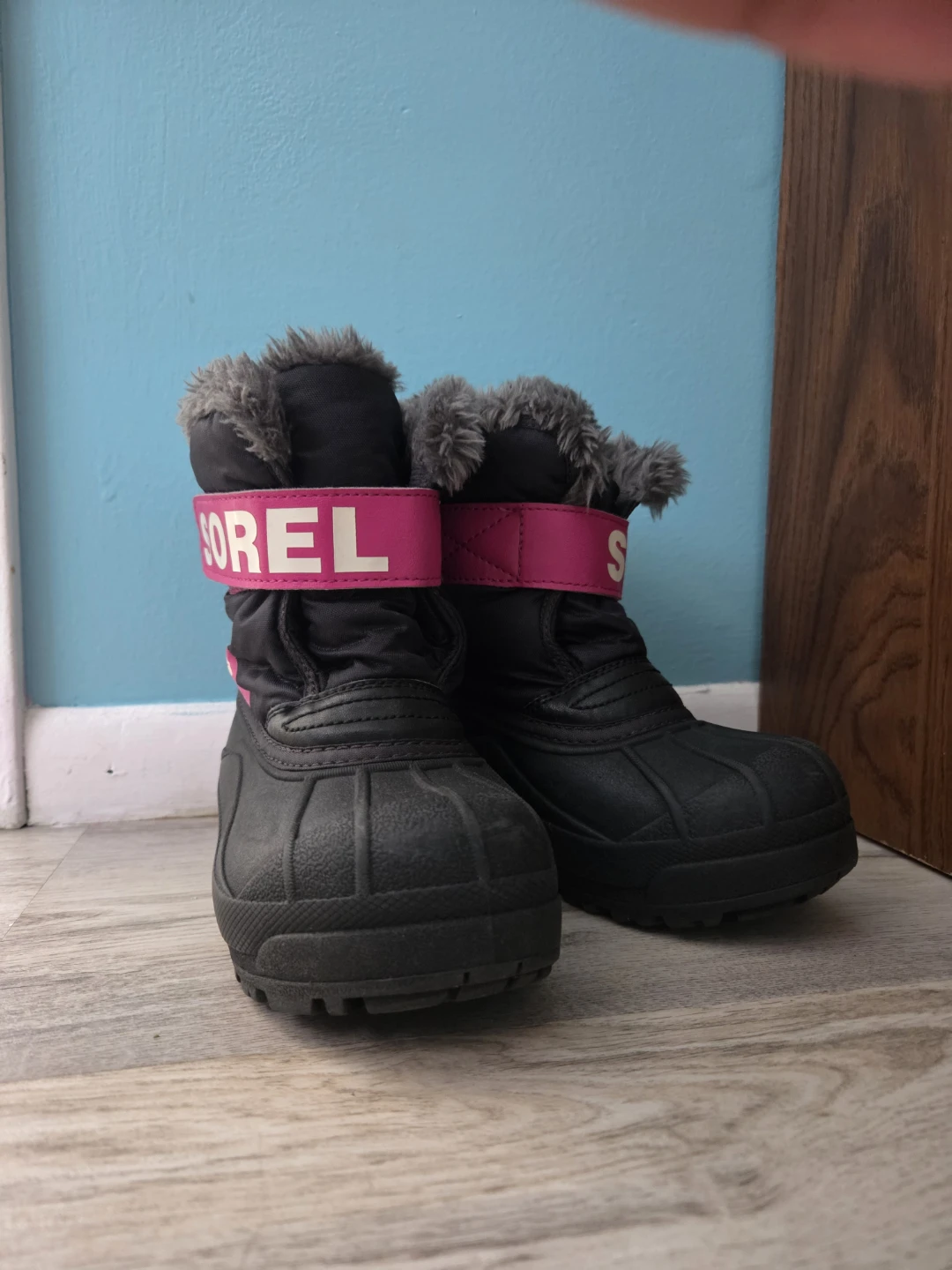 Sorel black winter boots with pink accents