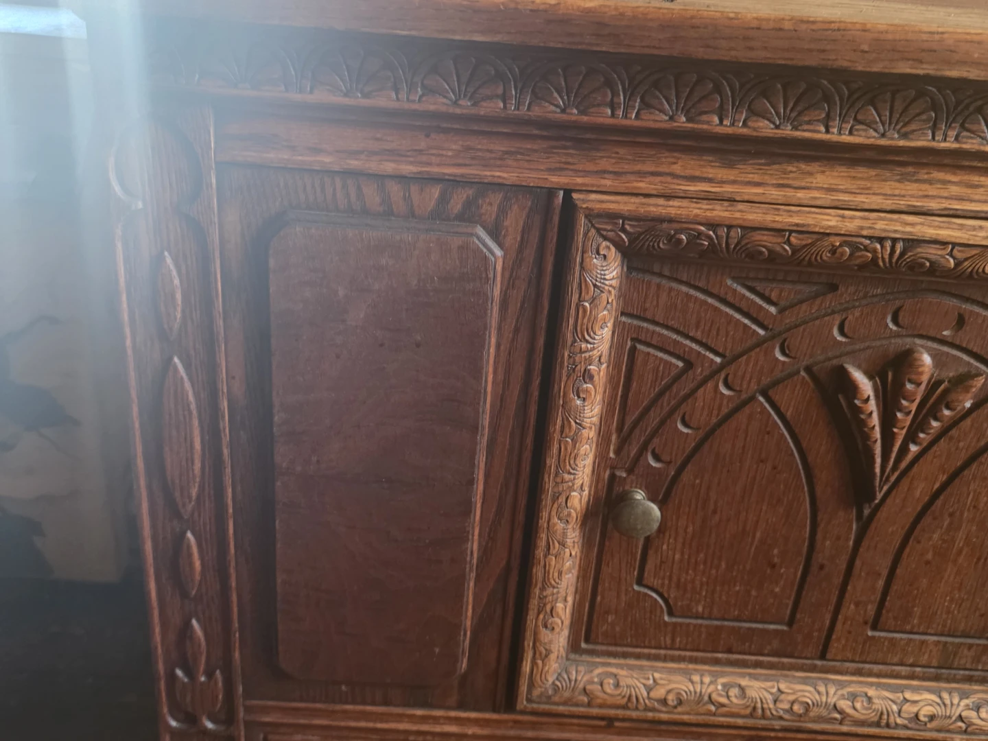 Antique Oak Cabinet with Carved Details