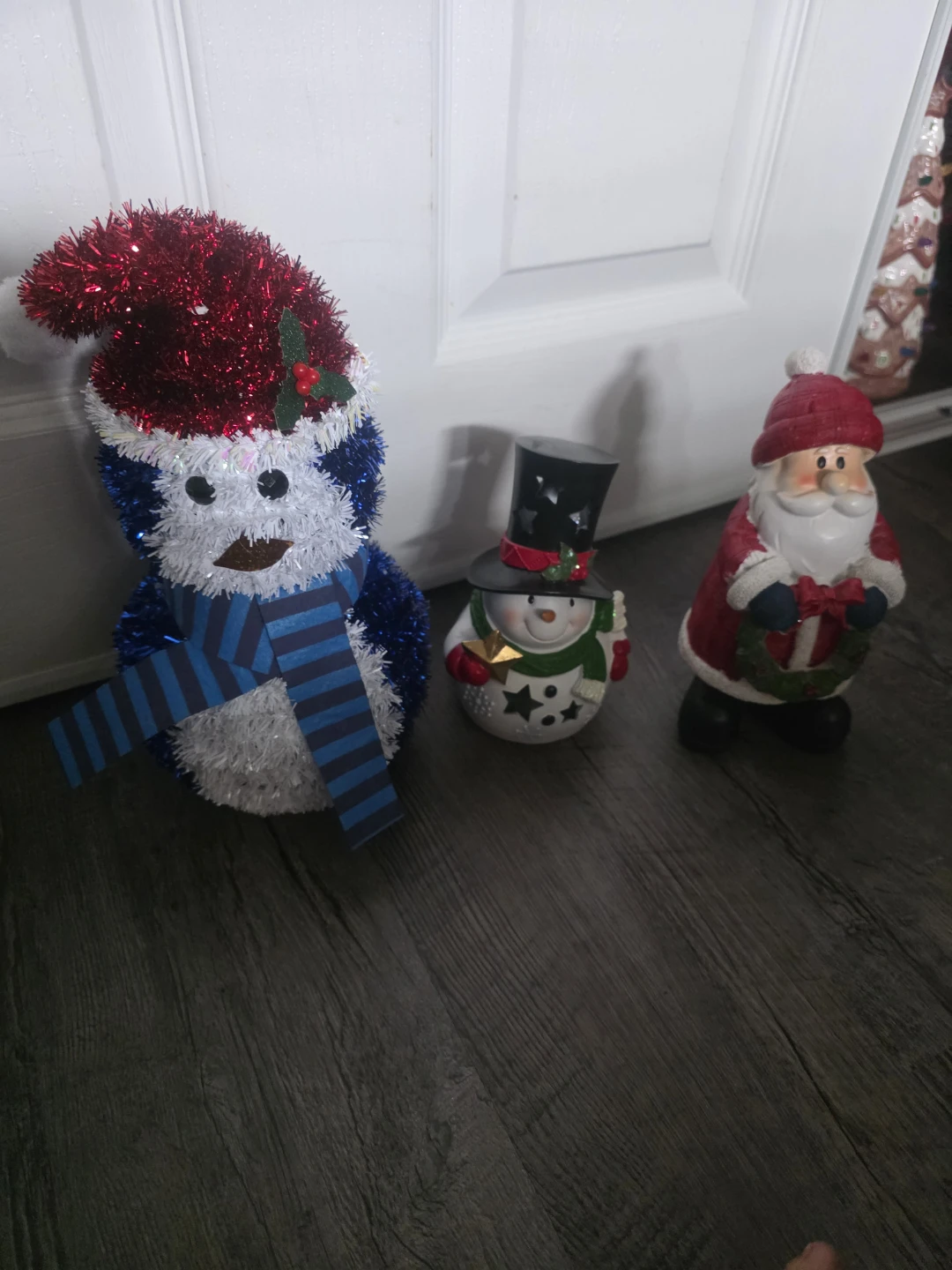 Christmas Figurines: Santa, Snowman, and Penguin