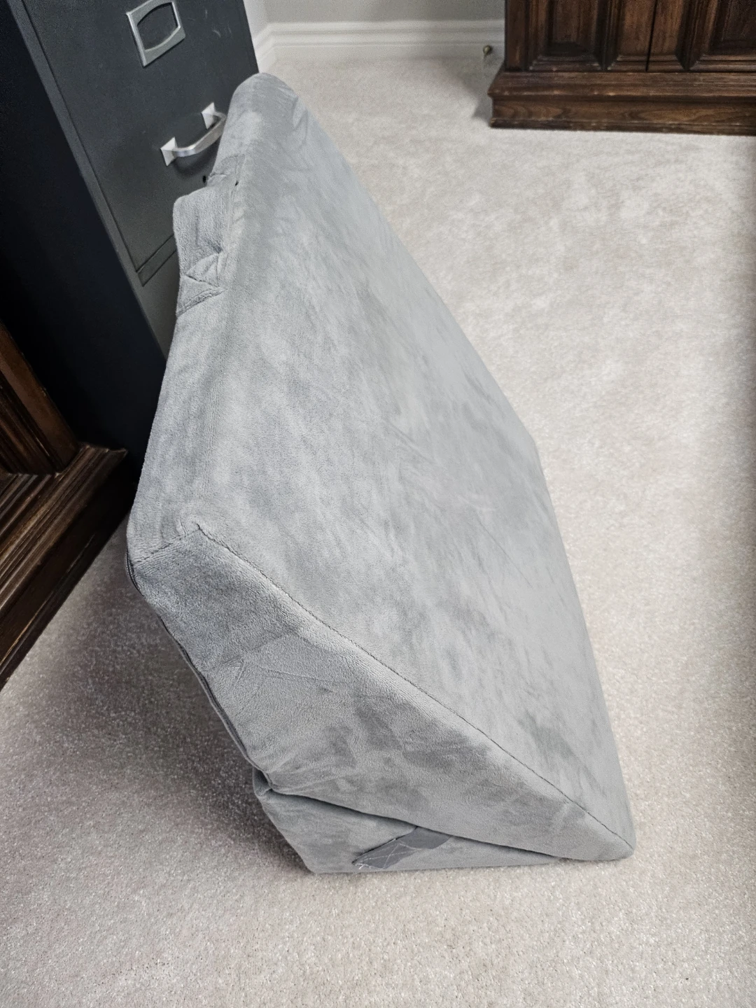 Foam wedge to prop up your body during a cold or your f