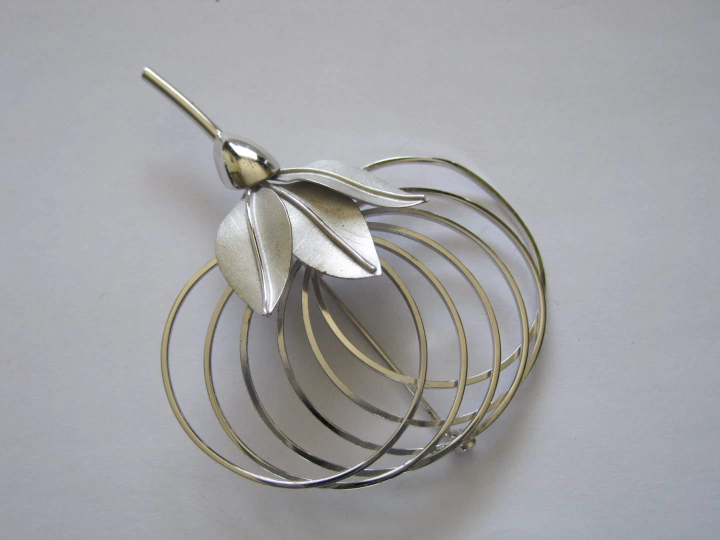 Silver tone modernist apple brooch