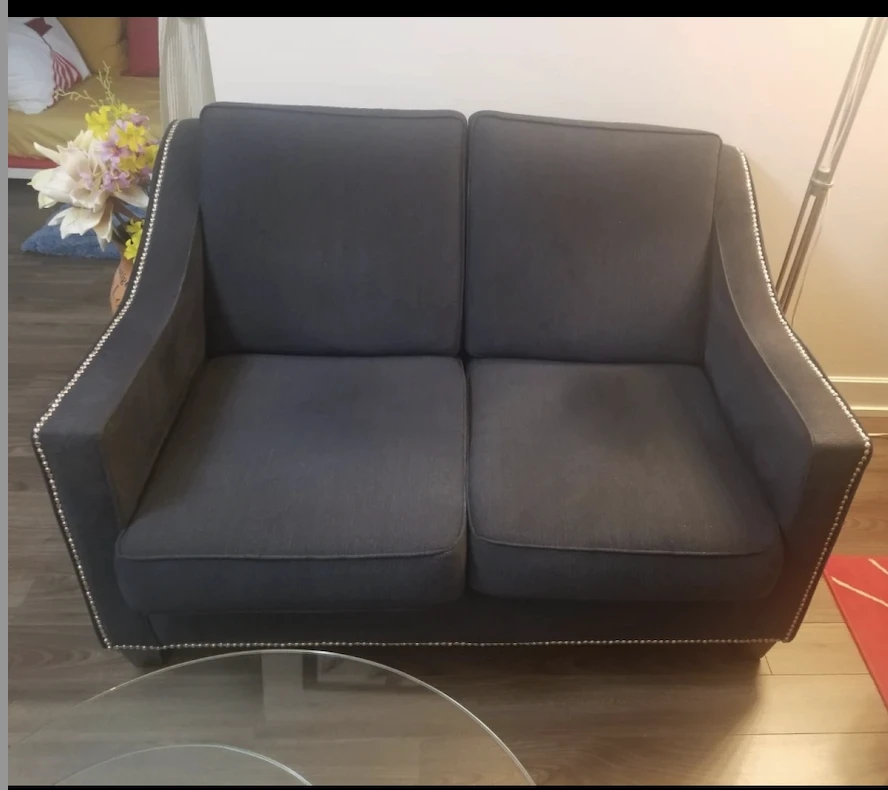 Dark Grey Two-Seater Sofa with Silver Studding