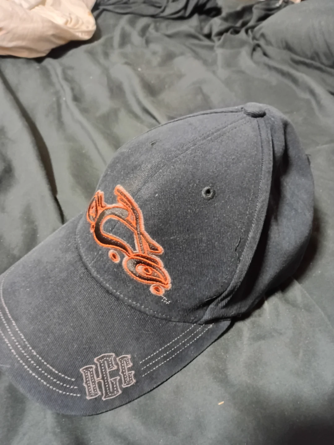 Dark Blue Baseball Cap with Orange Logo
