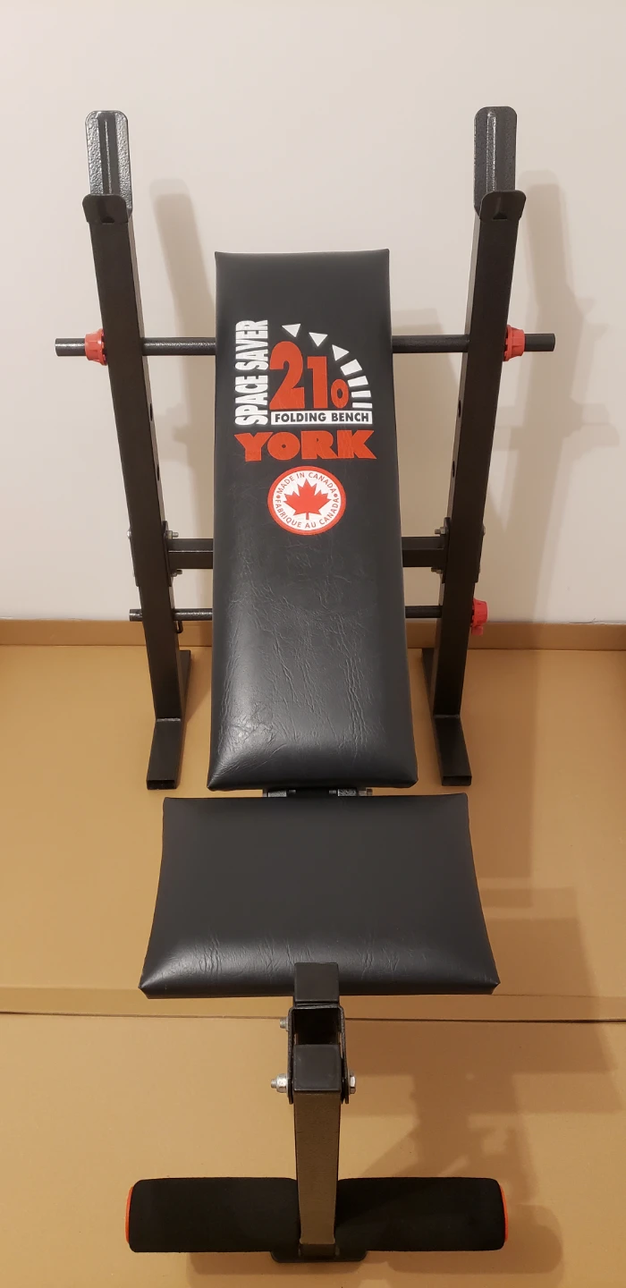 York 210 Folding Bench with Free Barbells