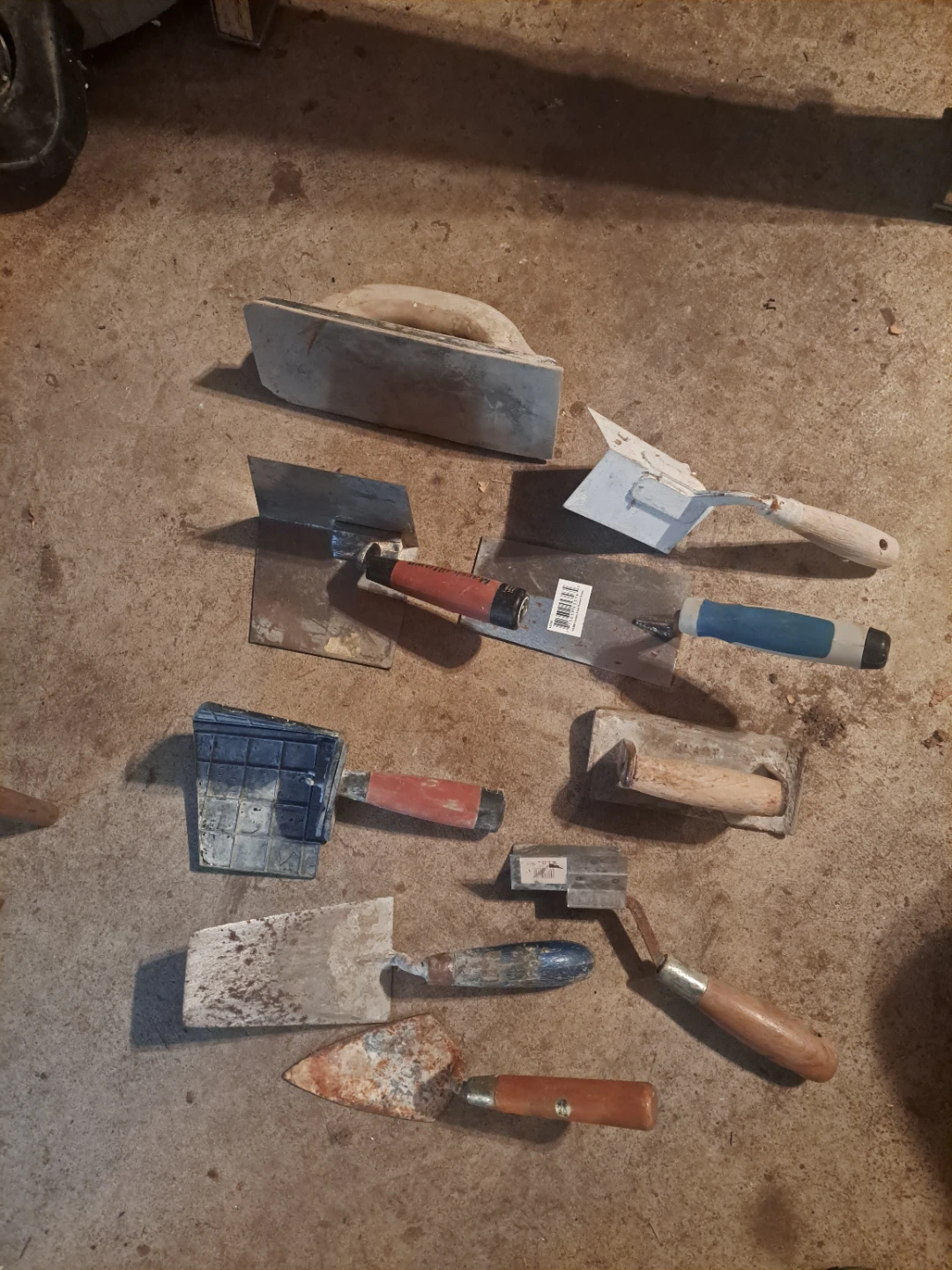 Assorted Trowels and Masonry Tools