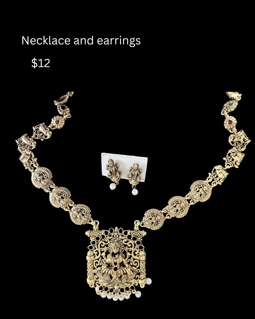 Gold tone necklace and earrings set