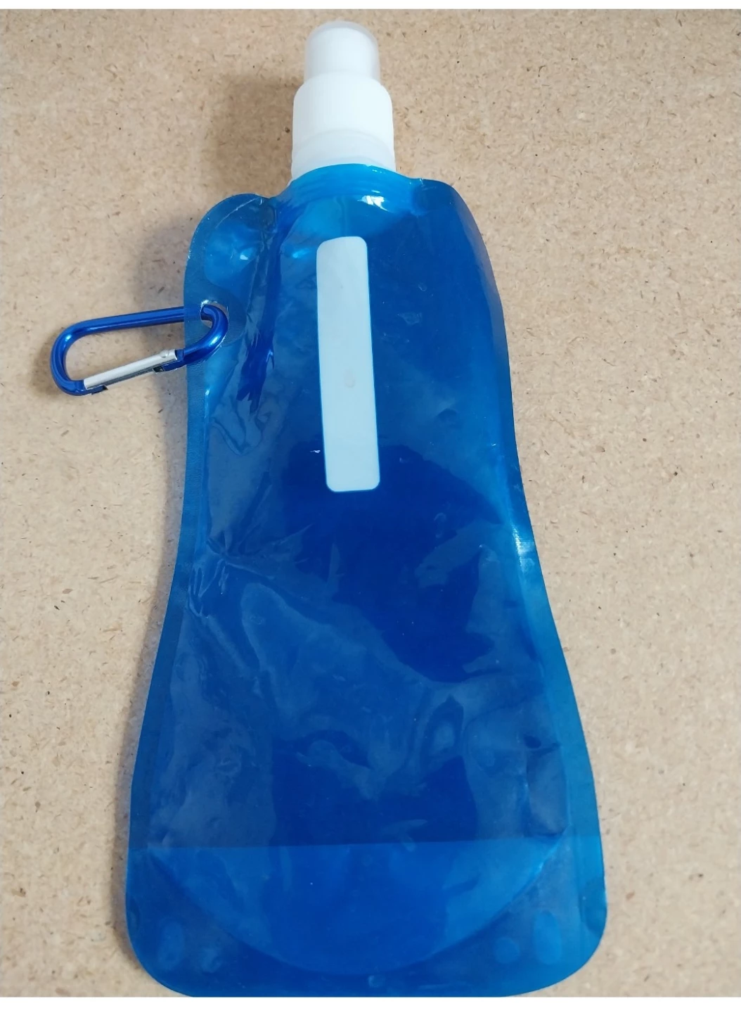 Blue Collapsible Water Bottle with Carabiner. Pick up only.