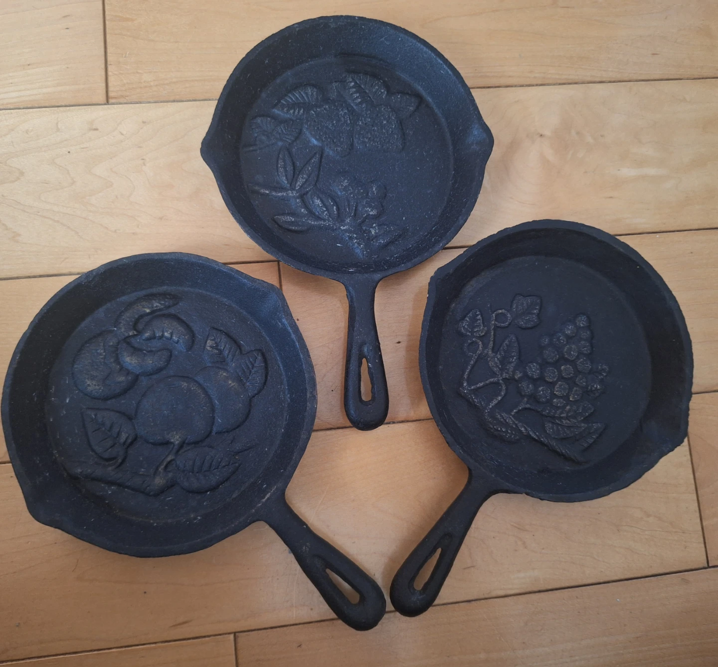 Vintage Cast Iron Skillets with Decorative Embossing