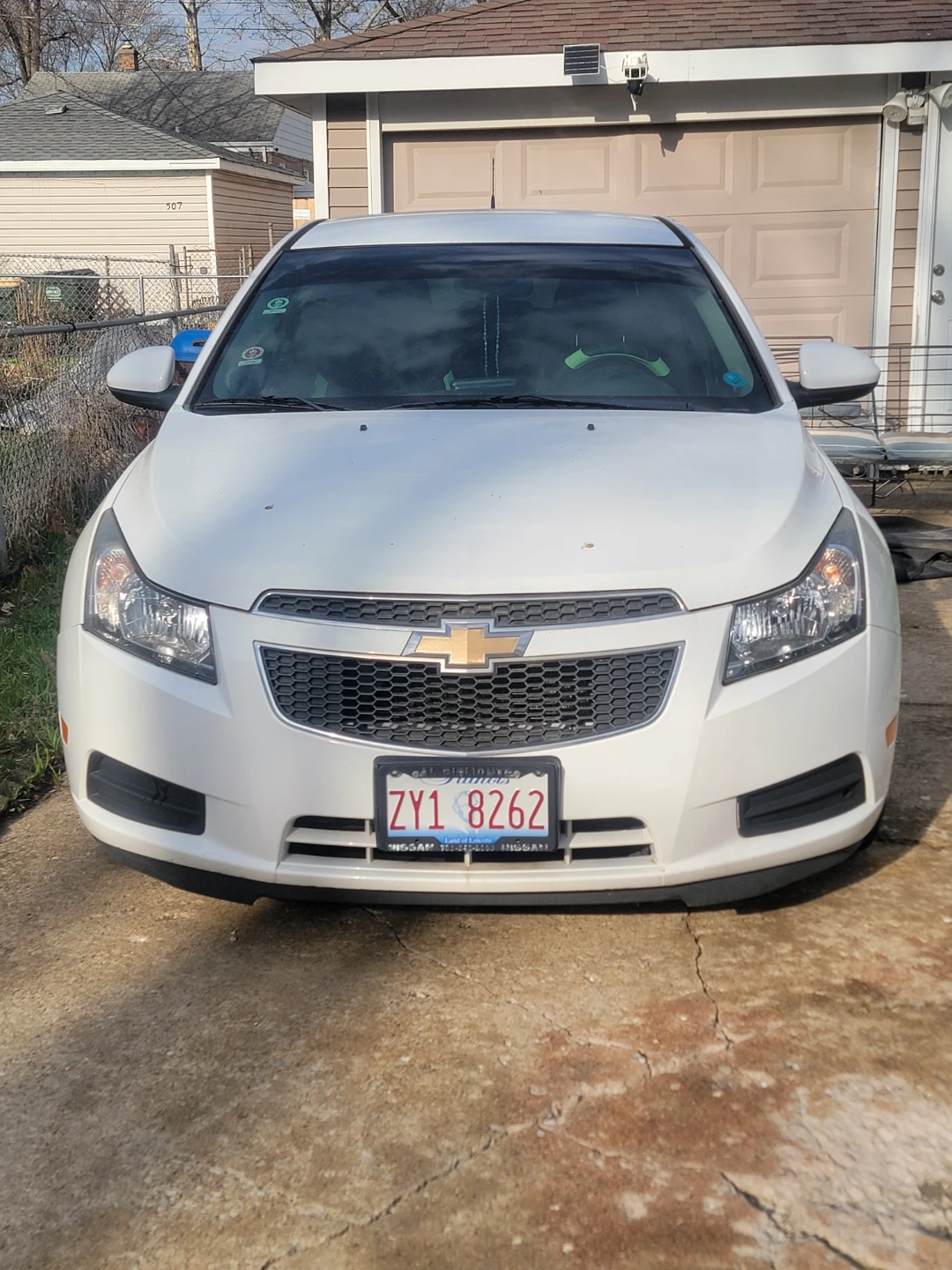 White Chevrolet Cruze with Neon Green Accents - photo 2