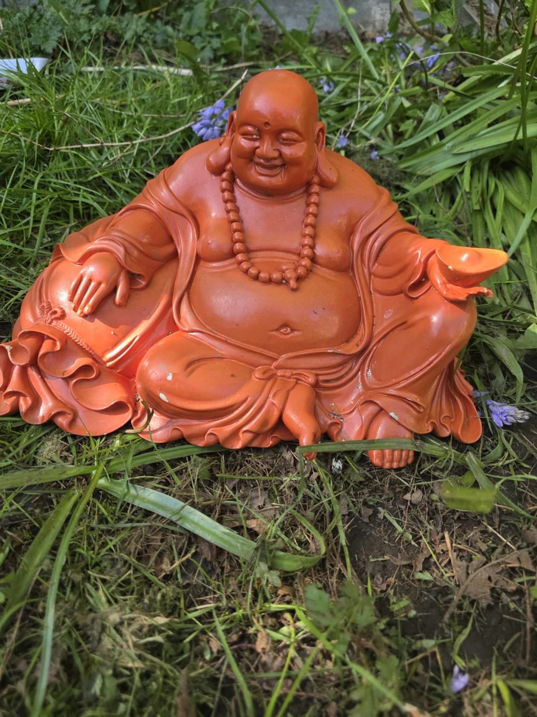 Orange Laughing Buddha Statue
