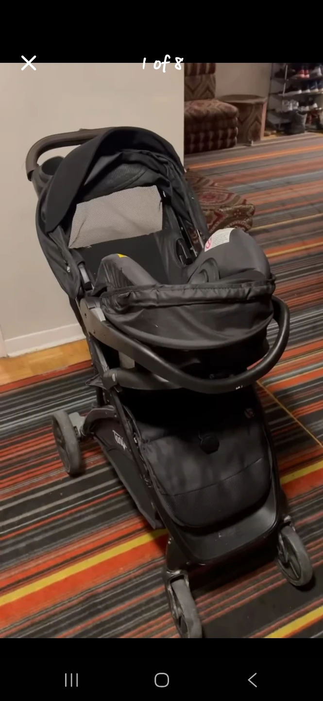 Black Graco Stroller with Infant Car Seat Adapter
