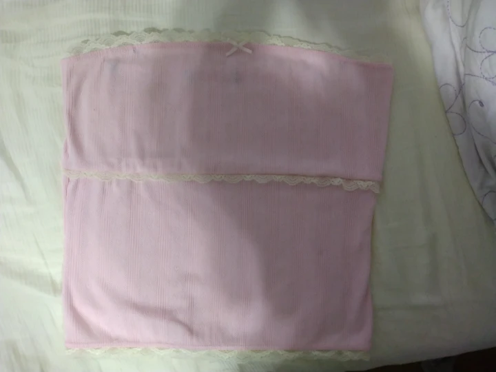 Pink strapless top with lace trim
