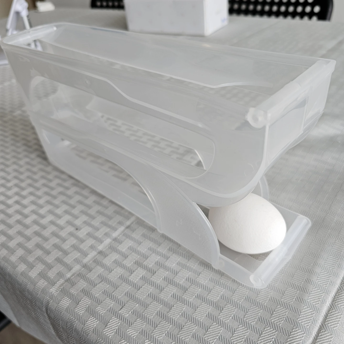 Clear Plastic Egg Holder with Rolling Design