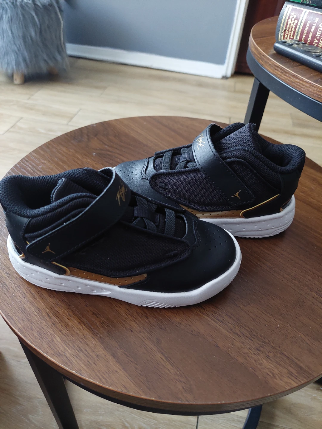 Jordan Black and Gold High-Top Sneakers