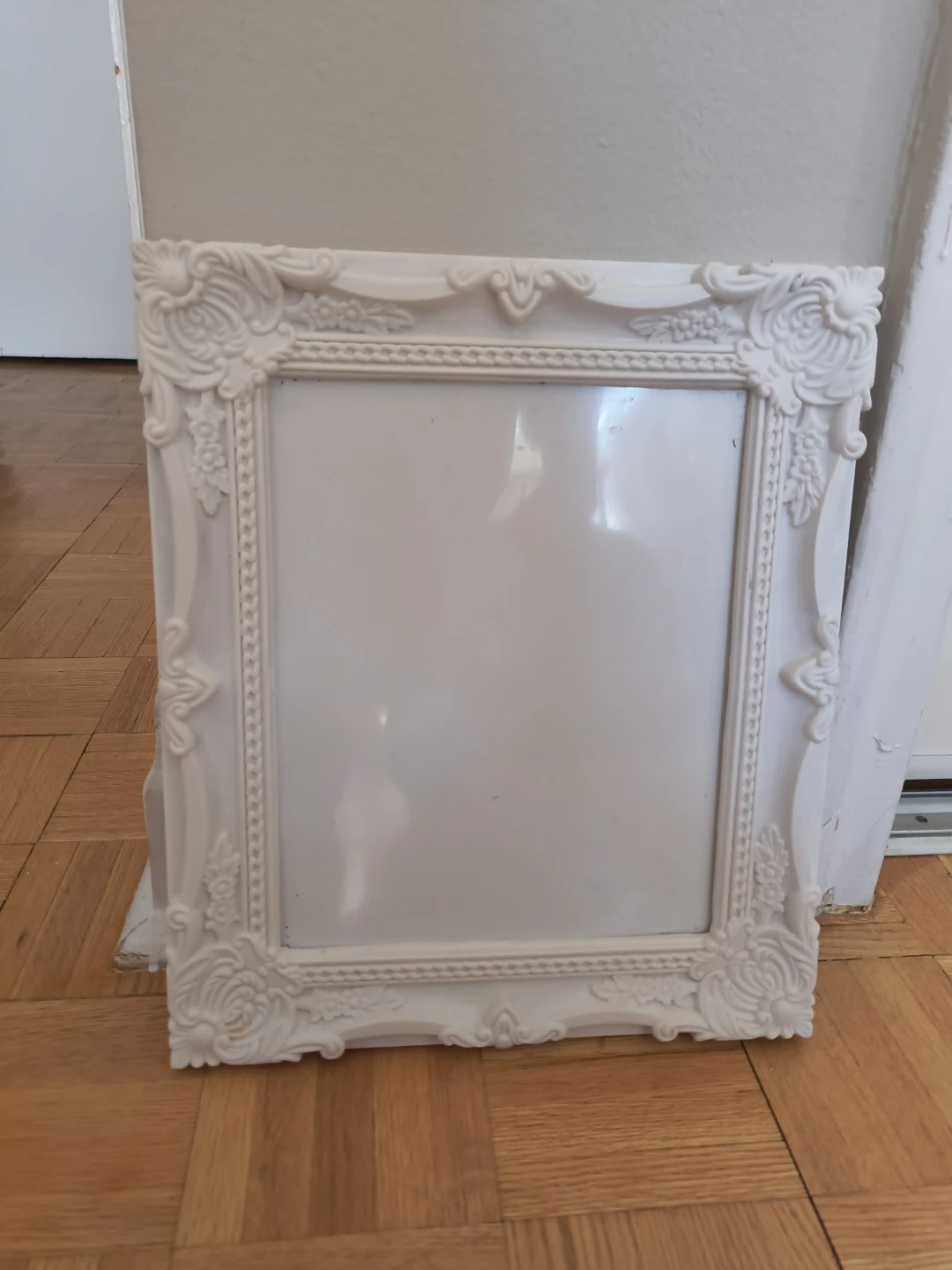 Ornate framed white board