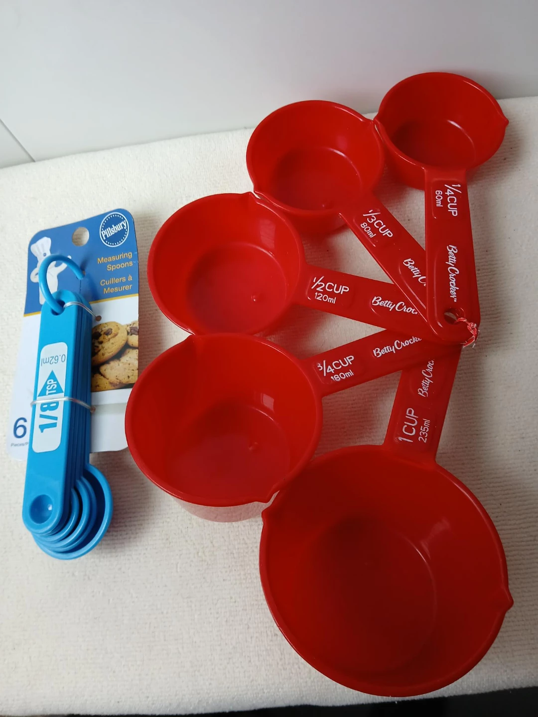 Betty Crocker & Pillsbury Measuring Cups & Spoons Set. Both $9.