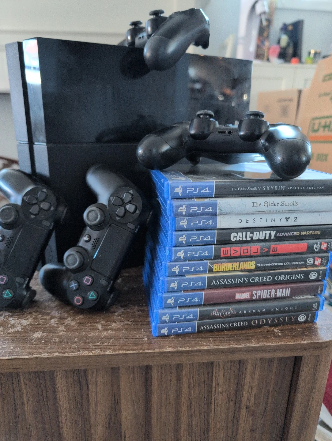 PlayStation 4 Console with 9 Games and 4 Controllers | Karrot