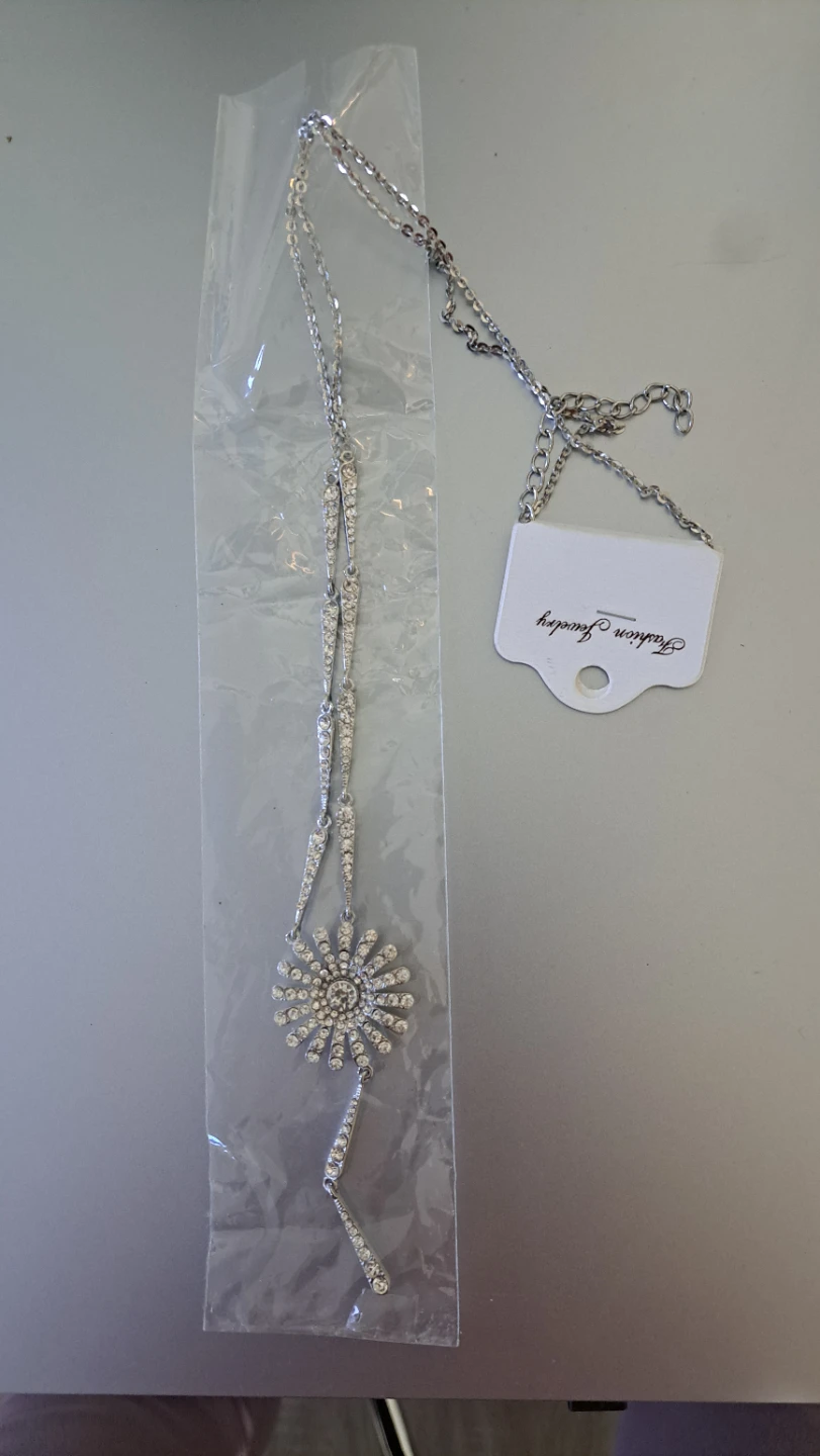 Silver tone lariat necklace with sunburst pendant - photo 5