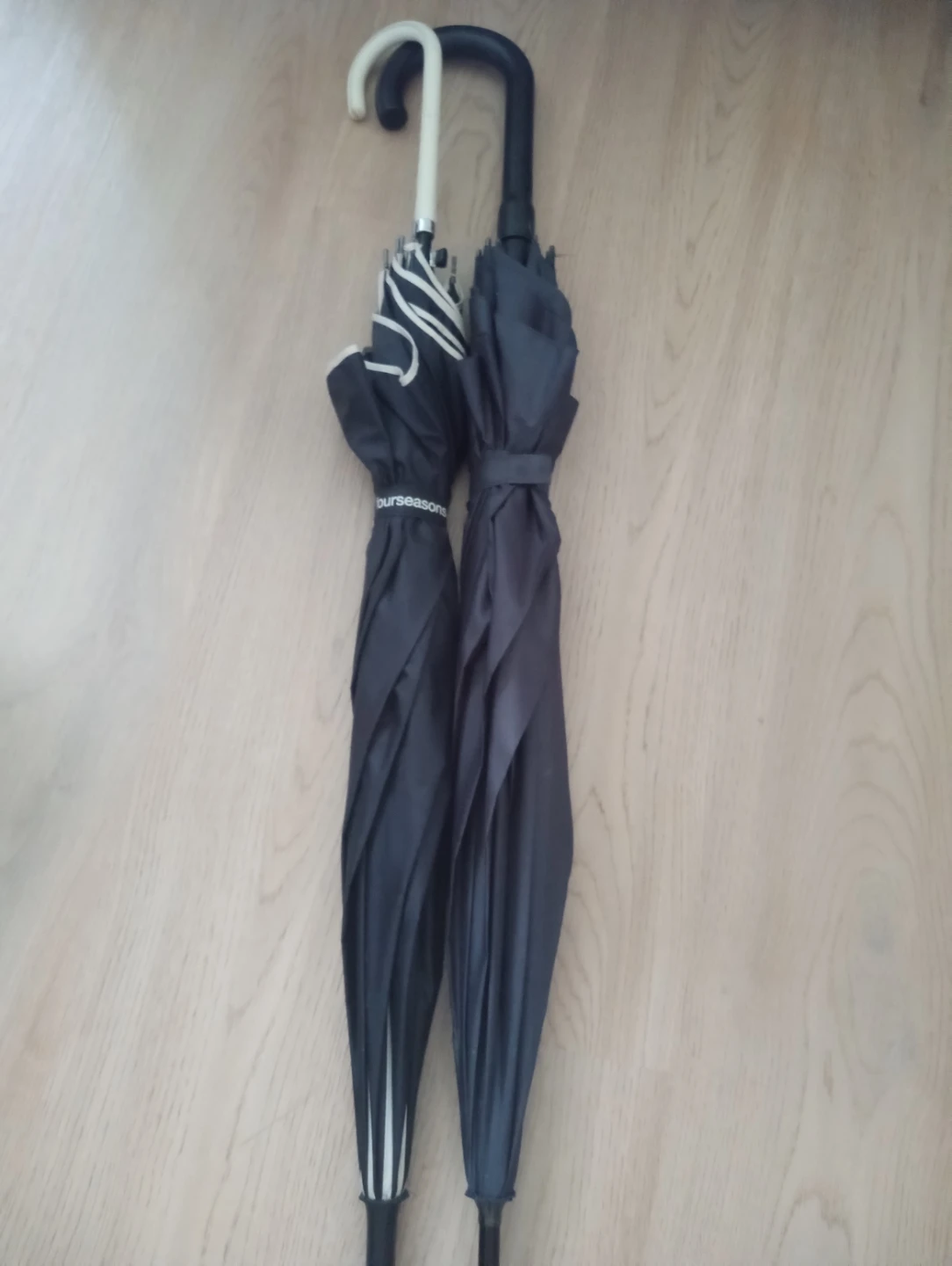 Branch new four seasons 2 umbrellas, $15