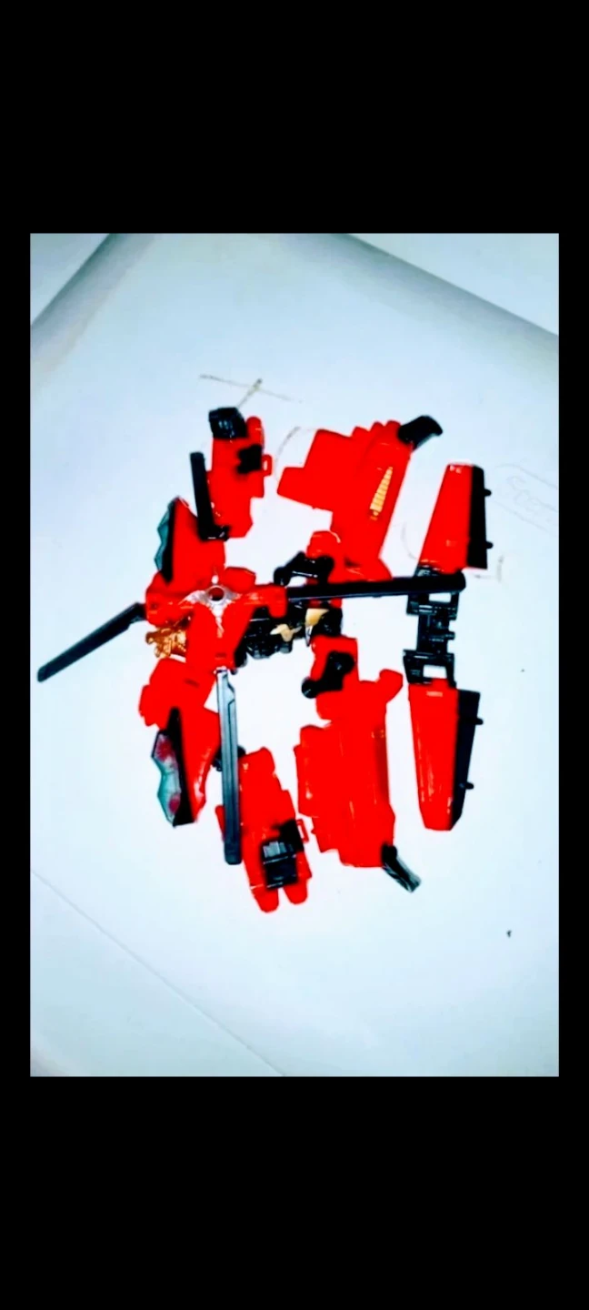 Red and Black Transformer Robot Toy