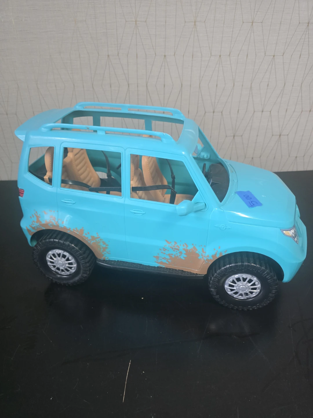 Blue Toy SUV with Mud Splatter Detail