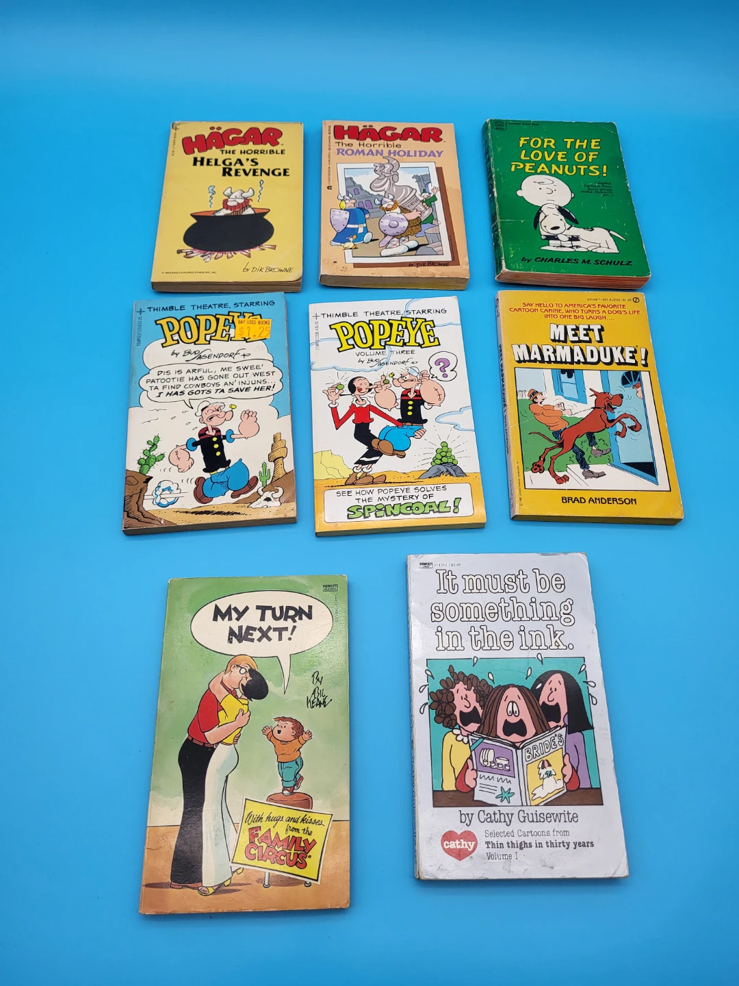 Collection of 7 Comic Books: Popeye, Hagar, Peanuts, and More