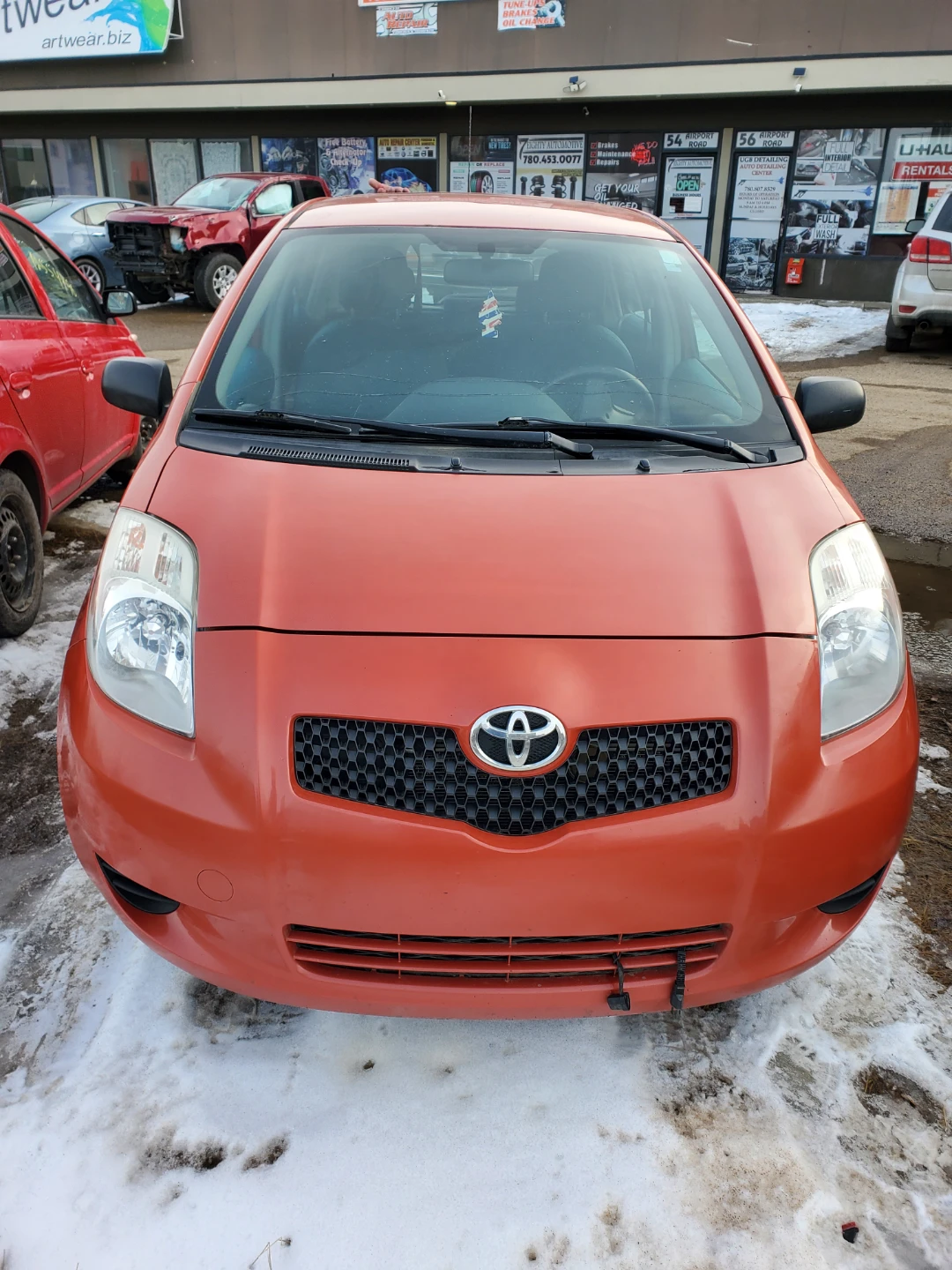 Orange Toyota Yaris Hatchback