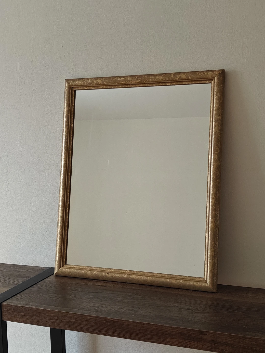 Gold leaf framed mirror