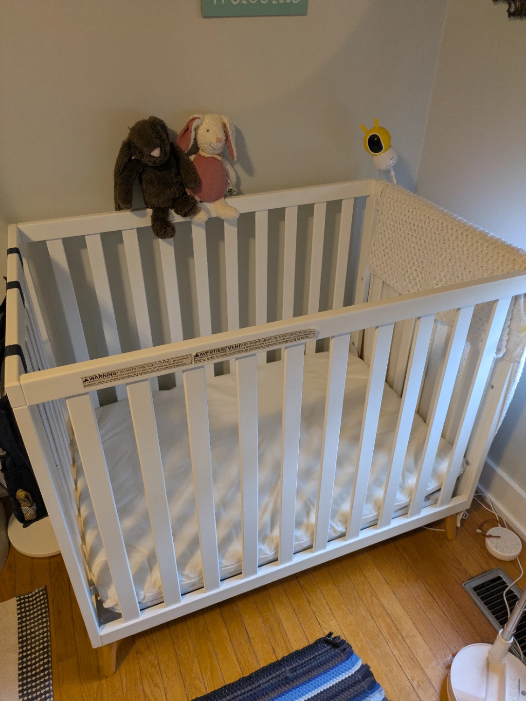 Delta Children Tucker Mini Crib with mattress