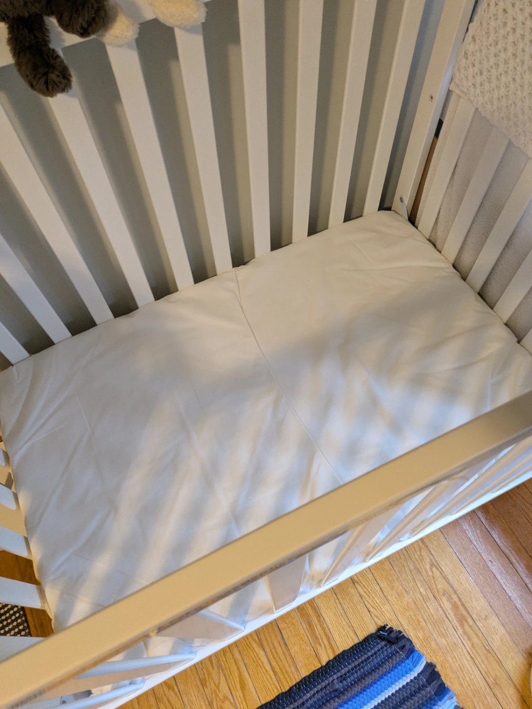 Delta Children Tucker Mini Crib with mattress - photo 2