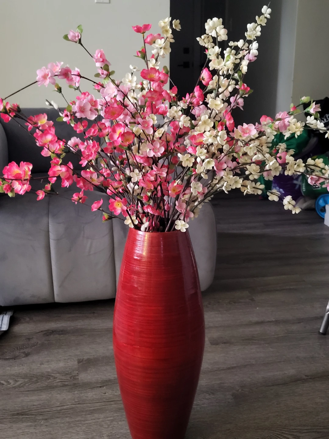 Red Ceramic Vase with Pink and White Artificial Cherry Blossoms