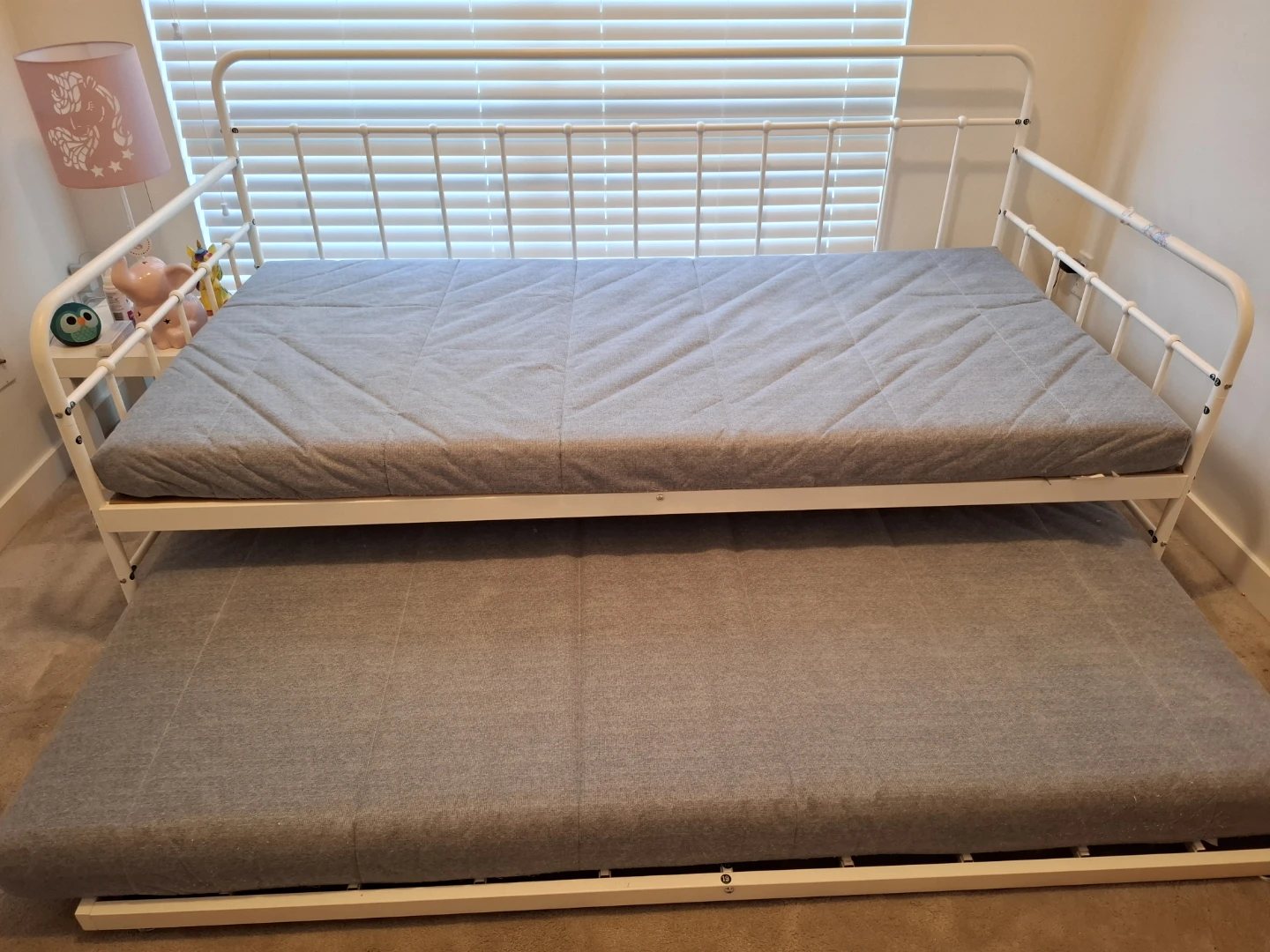 White Metal Daybed with Trundle and Grey Mattresses