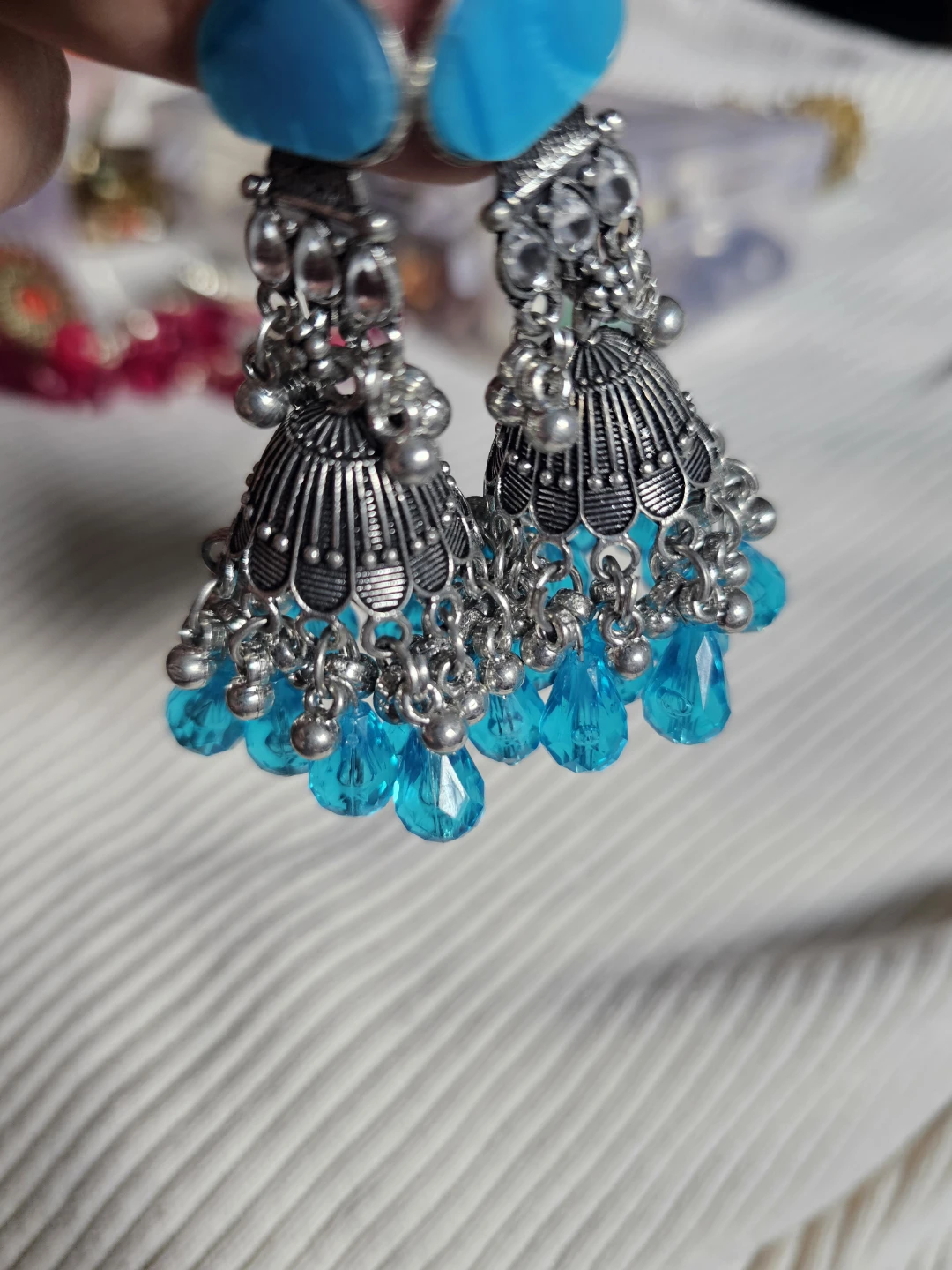 Silver Jhumka Earrings with Blue Beads