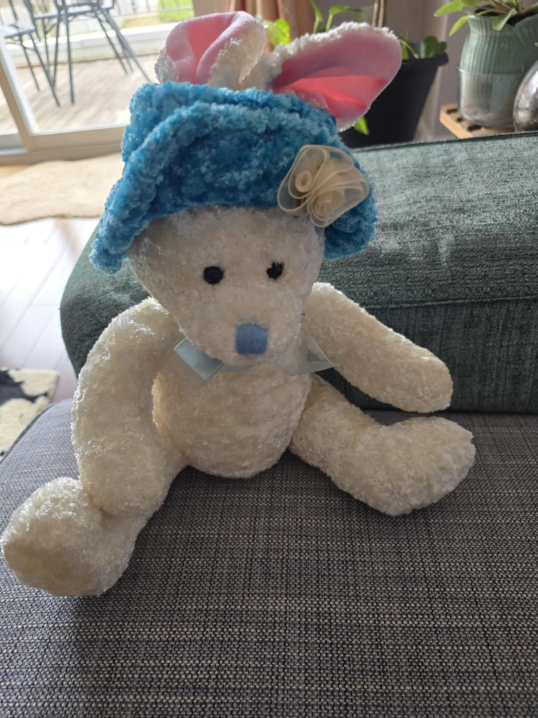 White Teddy Bear with Blue Bunny Hat
