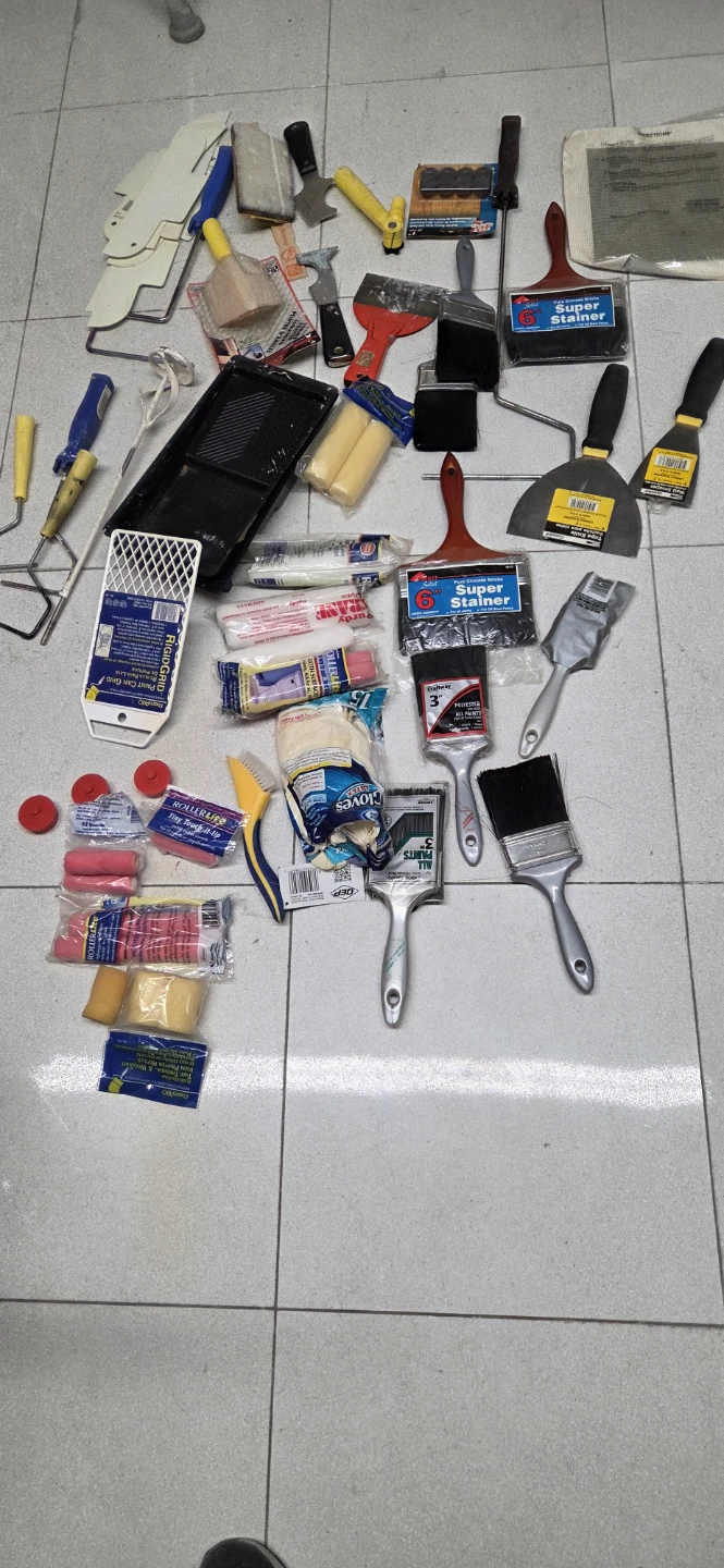 Assorted Paint Brushes, Rollers, and Tools