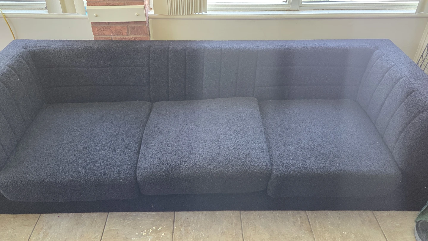 Black boucle fabric sectional sofa