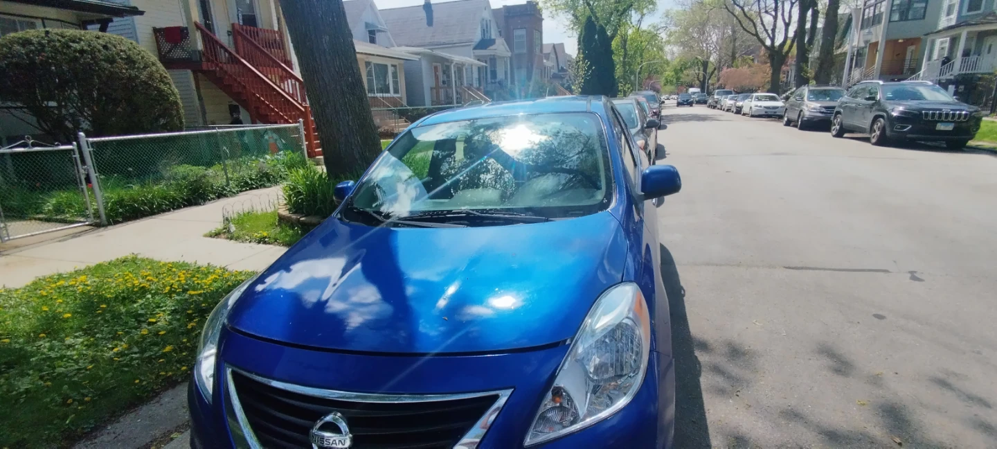 Blue Nissan Versa SV Sedan - photo 2