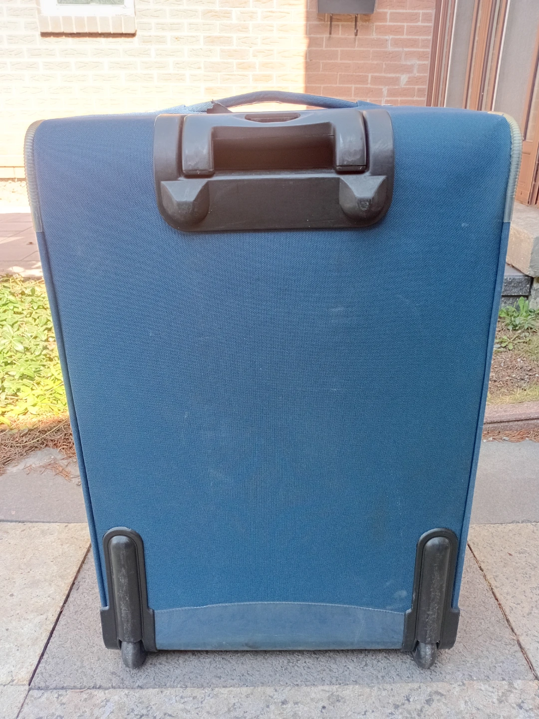 Blue soft-shell rolling suitcase - photo 2