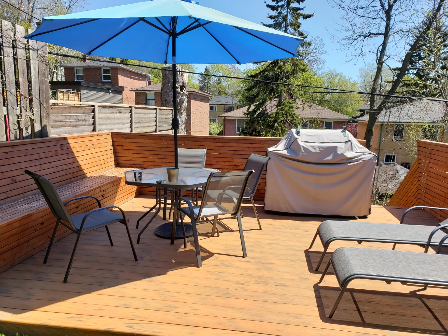 Outdoor Patio Set with Umbrella and lounge chairs