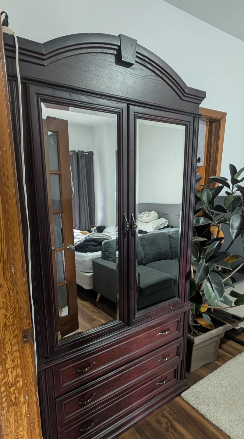 Dark Wood Armoire with Mirror Doors and Drawers