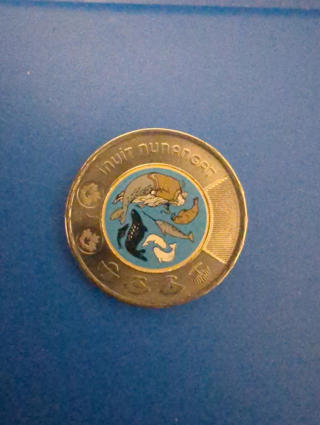 Vintage Coin with Marine Life Design