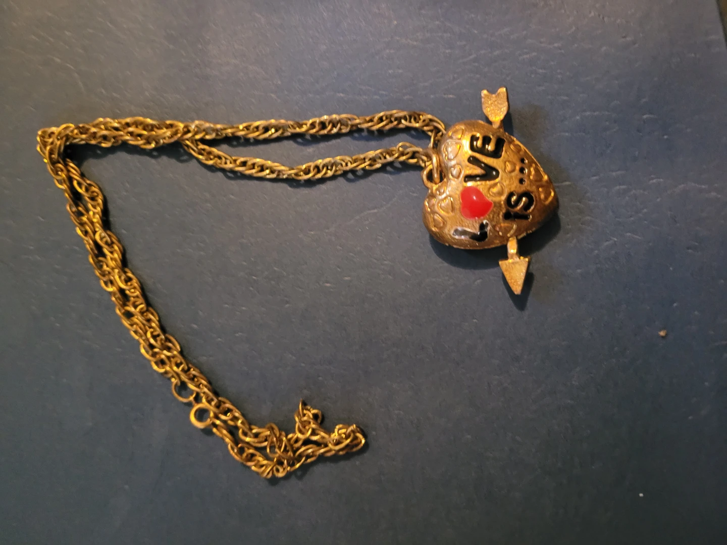 Gold Heart Necklace with "LOVE IS" Engraving