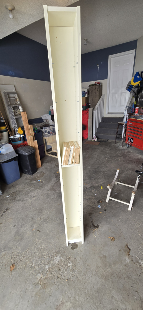 Tall white Ikea CD/Movie/Bookshelf