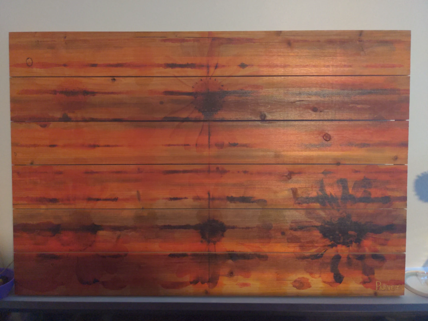 Wood plank art with floral design