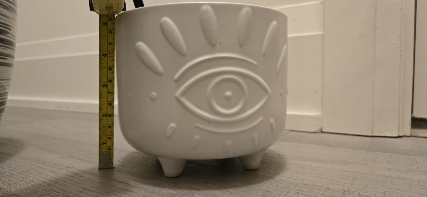 White Ceramic Planter with Eye Design