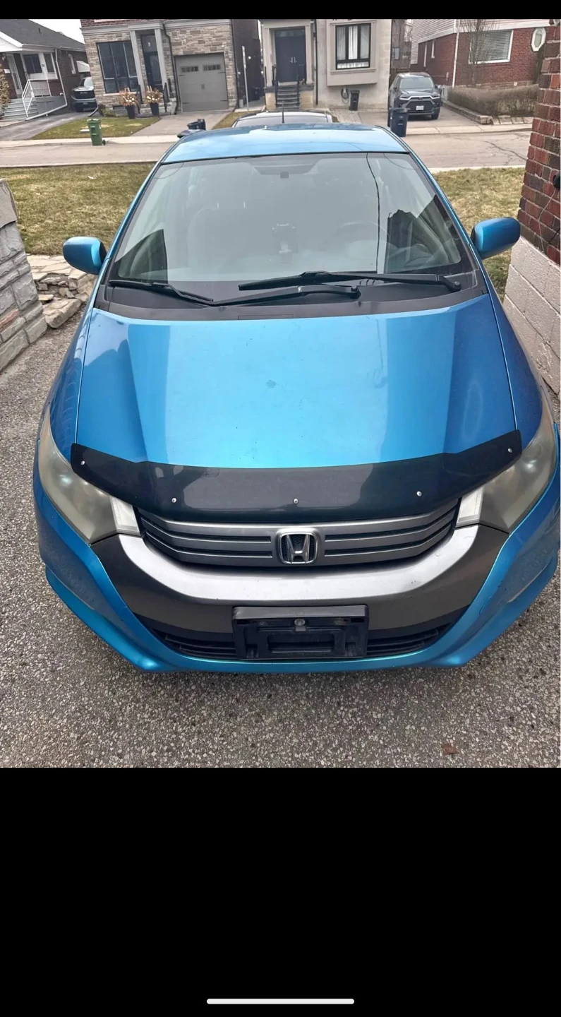 Blue Honda Insight Hybrid - photo 4